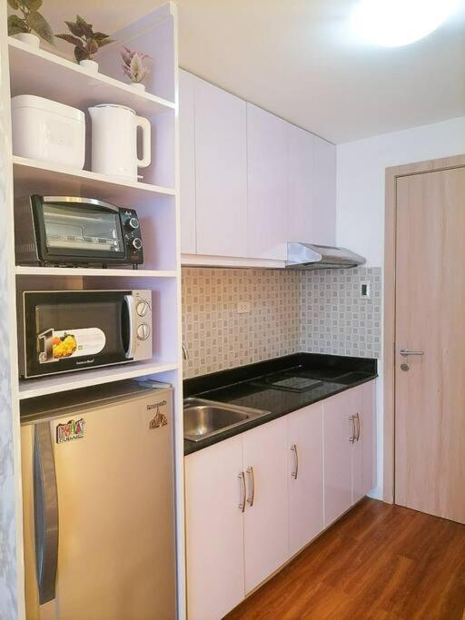 Cozy Studio Unit At Sun Residences Quezon City Exteriör bild